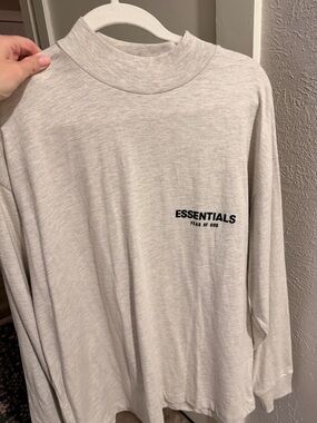 ESSENTIALS Light Heather Gray Long Sleeve Tee with Black Logo